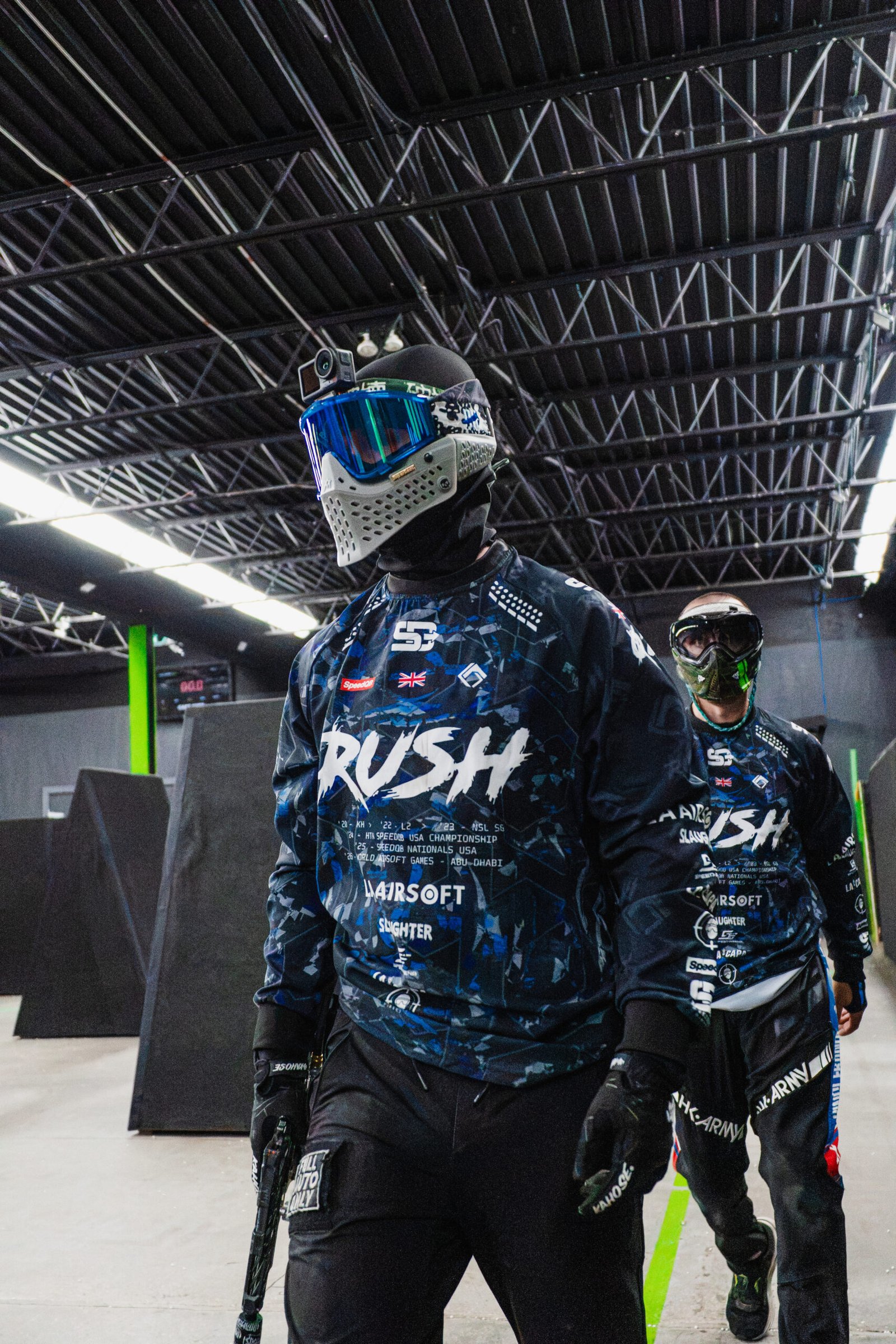 RUSH players wearing blue and black SD custom team jerseys