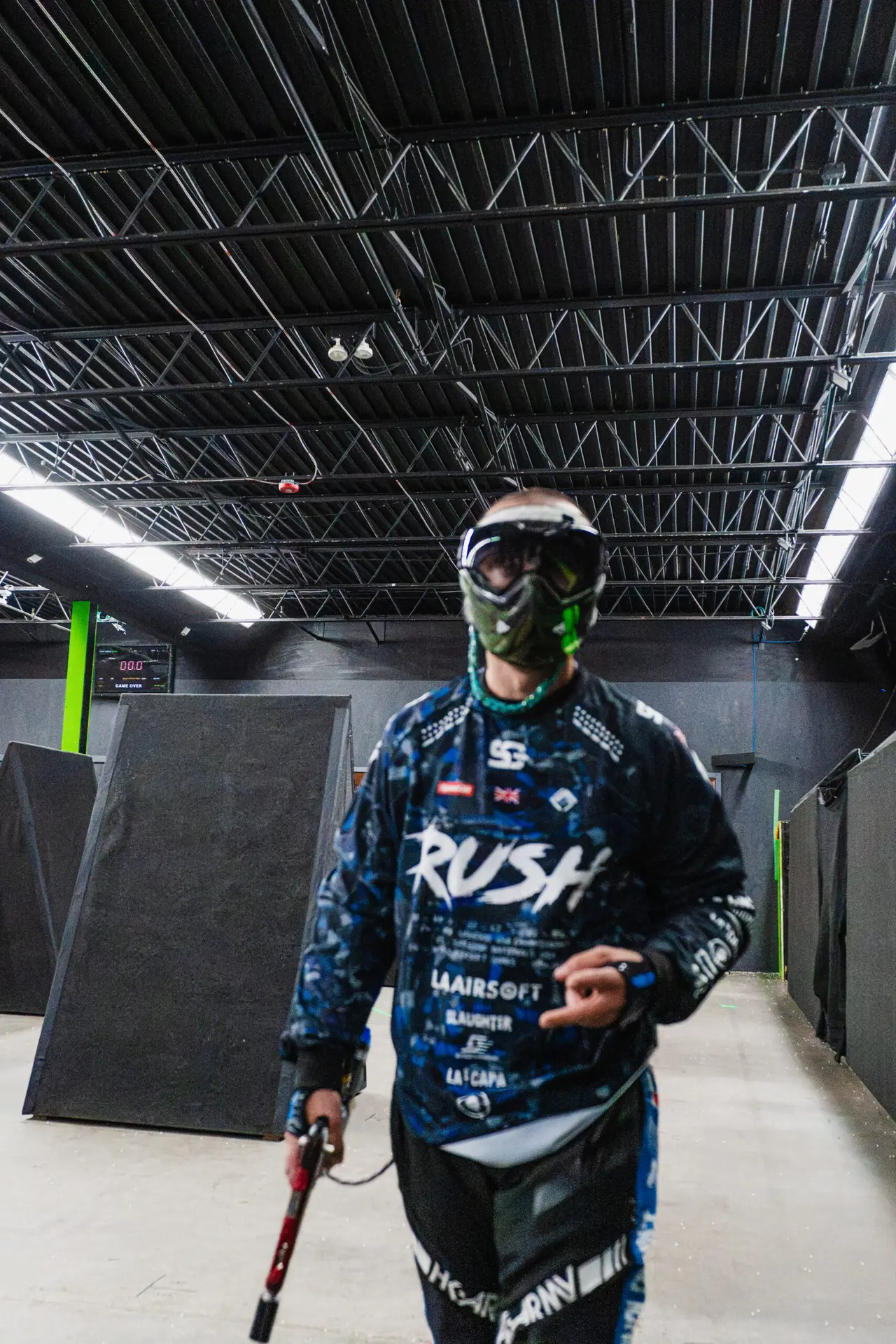 Blue and black RUSH custom jersey shown on a player